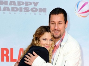 Adam Sandler hugging Drew Barrymore at the Blended premiere. (WENN.COM)