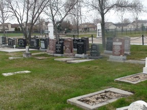 The last of the vandalized headstones at the Hebrew Sick Cemetery were restored Wednesday morning.
About 20 of them had been knocked over and damaged at the 100-year-old graveyard between May 9 and 11, 2014. 
Everlasting Memorials brought in a crane, a truck and six employees to rectify the damage done, free of charge.