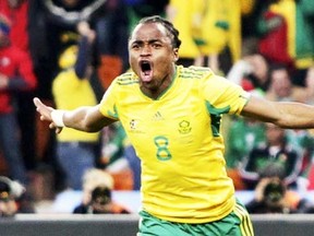 South Africa's Siphiwe Tshabalala celebrates after scoring against Mexico during the 2010 World Cup opening match at Soccer City stadium in Johannesburg June 11, 2010. (REUTERS)
