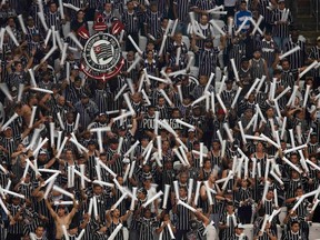 Corinthians soccer fans cheer their team at the Arena de Sao Paulo Stadium, one of the venues for the 2014 World Cup, during a test match on May 18, 2014. (Paulo Whitaker/Reuters)