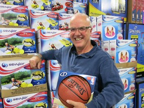 Real Deals owner Joel Clarridge is really on the ball. His warehouse is crammed with goods featuring massive savings.
