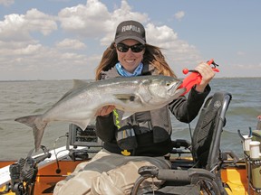 Ashley Rae with a 31-inch bluefish caught and released in the Jamaica Bay Kayak Fishing Classic Tournament. (supplied photo)