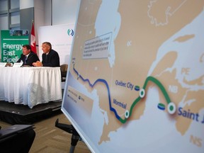 TransCanada President and CEO Russ Girling (2nd L) announces the Energy East Pipeline during a news conference in Calgary, Alberta, in this August 1, 2013, file photo.  
REUTERS/Todd Korol/Files