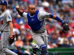 Catcher Miguel Olivo of the Los Angeles Dodgers throws during a game against the Washington at Nationals Park on May 7, 2014. (Patrick Smith/Getty Images/AFP)