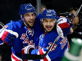 Rangers’ Derick Brassard (left) celebrates his goal with Mats Zuccarello versus the Penguins. Brassard was injured in Game 1 against the Canadiens, but could return to the lineup tonight. (AFP)