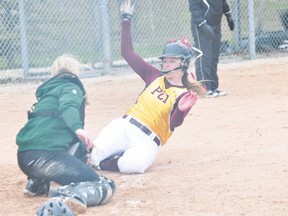 Sarah Thomson of the PCI Saints fastpitch team slides into home during the Zone 4 tournament in Portage la Prairie May 21. (Kevin Hirschfield/THE GRAPHIC/QMI AGENCY)