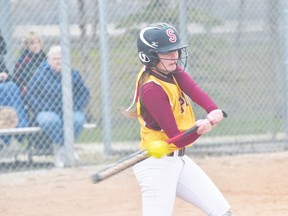 Emily Smith of the PCI Saints fastpitch team takes a swing during the Zone 4 tournament in Portage la Prairie Wednesday. (Kevin Hirschfield/THE GRAPHIC/QMI AGENCY)