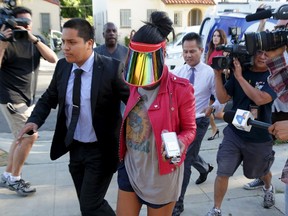 Model who uses the name V. Stiviano walks outside her home in Los Angeles, California April 28, 2014. (REUTERS/Jonathan Alcorn)
