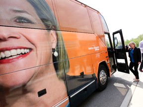 NDP Leader Andrea Horwath boards her campaign bus on May 21.
Dave Thomas/Toronto Sun