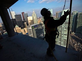 A worker is pictured at a Toronto condominium construction site. (REUTERS)