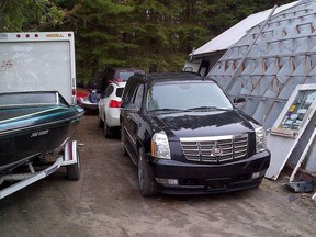 Mayor Rob Ford's Cadillac Escalade sits in an impound lot in Gravenhurst May 22, 2014, after it was seized during the drunk driving arrest of a woman named Lee Ann McRobb. (CHRIS DOUCETTE, Toronto Sun)