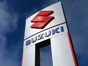 A view shows a Suzuki car dealership sign in National City, California November 6, 2012.   REUTERS/Mike Blake