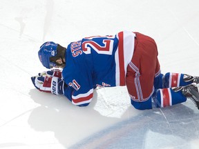 Rangers forward Derek Stepan suffered a broken jaw after an open-ice hit by Canadiens forward Brandon Prust during the first period of Game 3 of the Eastern Conference final in New York on Thursday, May 22, 2014. (Ben Pelosse/QMI Agency)