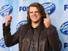 Winner Caleb Johnson poses backstage at the American Idol XIII 2014 Finale in Los Angeles, California May 21, 2014.  REUTERS/Danny Moloshok