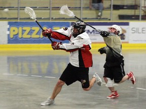 A Slash defender tries, in vain, to chase down a forward for the St. Albert Miners who was sprung loose on a breakaway, during their game in the Grove. The Slash got off to a great start in the game but couldn’t keep the momentum going as the Miners recovered to post a 24-6 win. - Gord Montgomery, Reporter/Examiner