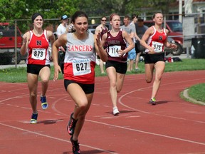 LCCVI's McKayla Eves, pictured here during the LSSAA senior girls 200m dash, won both the 100 and 200m sprints at the SWOSSAA track and field championships this past week, and added a 2nd place finish in the 100m hurdles. Eves will now move on to the OFSAA West Regional competition, as will other Lambton high school athletes that finished in the top six in their event at SWOSSAA.  SHAUN BISSON/ THE OBSERVER/ QMI AGENCY