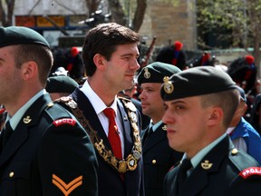 Mayor Don Iveson inspects the troops during the Freedom of the City Parade in Edmonton, Alberta on  Friday, May 23, 2014.  The 1st Battalion, Princess Patricia’s Canadian Light Infantry (1 PPCLI) exercised their right to the Freedom of the City of Edmonton by marching through the streets.  Perry Mah/ Edmonton Sun/ QMI Agency