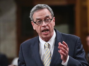 Finance Minister Joe Oliver speaks during Question Period in the House of Commons on Parliament Hill in Ottawa May 12, 2014. (REUTERS/Chris Wattie)