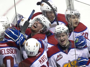 Edmonton players celebrate after Curtis Lazar scored in the third overtime to end the longest game in Memorial Cup history during CHL Memorial Cup semifinal action between the Edmonton Oil Kings and the Val d'Or Foreurs in London, Ont. on Friday May 23, 2014. (DEREK RUTTAN, The London Free Press)