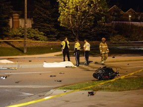 Two people that were riding a motorcycle are dead after a collision at the intersection of McGlaughlin Rd. and Sandalwood Pkwy. in Brampton.(ANDREW COLLINS/Special to the Toronto Sun)