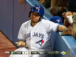 Toronto Blue Jays ball boy Lucas Lucchetta reacts after missing a diving catch on a foul line drive Friday against the Oakland Athletics. (MLB.com)
