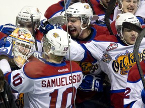 Edmonton players celebrate after Curtis Lazar scored in the third overtime to end the longest game in Memorial Cup history during CHL Memorial Cup semi-final action between the Edmonton Oil Kings and the Val-d'Or Foreurs in London, Ont. on Friday May 23, 2014.  DEREK RUTTAN/ The London Free Press /QMI AGENCY