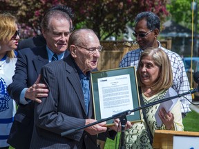 Former Toronto Maple Leaf goalie and hockey legend Johnny Bower -- flanked by Deputy Mayor Norm Kelly, left, and Councillor Frances Nunziata -- at road-naming ceremony on the street formerly known as Patika Ave. (ERNEST DOROSZUK/Toronto Sun)