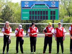 The new scoreboard at the Don Ogden Little League Park in Centennial Park, Trenton, is unveiled during a ceremony Saturday, May 24, 2014. 
Emily Mountney/The Intelligencer/Trentonian