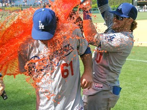 Los Angeles Dodgers pitcher Josh Beckett (left) has Gatorade dumped on him by teammate Justin Turner after pitching a no-hitter against the Philadelphia Phillies Sunday at Citizens Bank Park. (Eric Hartline/USA TODAY Sports)