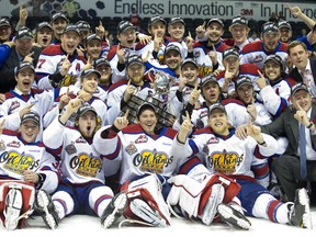 The Edmonton Oil King's pose with  their  Memorial Cup after defeating the Guelph Storm 6-3 London, Ont. on Sunday May 25, 2014.  DEREK RUTTAN/ The London Free Press /QMI AGENCY