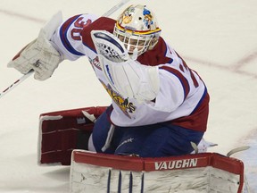 Edmonton Oil Kings goalie Tristan Jarry make a glove save during the  Memorial Cup final. The Oil Kings defeated the Guelph Storm 6-3.  DEREK RUTTAN/ The London Free Press /QMI AGENCY