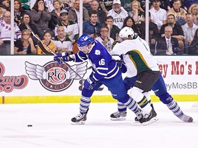 Sam Carrick, battling a Stars player in Game 1, is just one of the Marlies’ youthful corps that has given the team the balance it needs. (Courtesy Texas Stars)