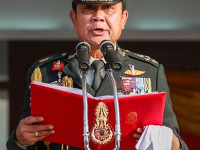 General Prayuth Chan-ocha, chief of the Royal Thai Army makes a speech during Thailand's National Armed Forces Day at the Thai Army 11th Infantry Regiment in Bangkok January 18, 2014. Thai coup leader General Prayuth Chan-ocha will receive the endorsement of King Bhumibol Adulyadej on Monday as head of a ruling military council and the general will then give his first address to the nation since seizing power last week.
REUTERS/Athit Perawongmetha