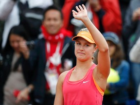 Eugenie Bouchard salutes the crowd after defeating Shahar Peer at the French Open in Paris on Monday, May 26, 2014. (Stephane Mahe/Reuters)