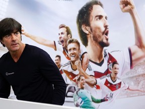 German national soccer coach Joachim Loew arrives for a news conference in St. Martin, northern Italy, May 26, 2014. REUTERS/Ina Fassbender