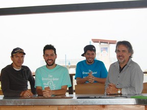 Peter, Valante, Frankie and Sam Karamoutzos at the newly renovated Growling Gator looking over Lake Huron in Grand Bend.