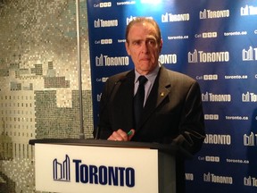 Deputy Mayor Norm Kelly speaks to reporters at Toronto City Hall on Monday, May 26, 2014. (Don Peat/Toronto Sun)