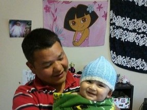 Erwin Lapatak, 37, and his baby Erwin Jr.