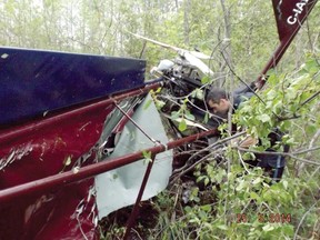 The wreckage of an aircraft that crash landed near the Brockville airport is inspected following the incident Sunday. (PHOTO COURTESY OF ELIZABETHTOWN-KITLEY FIRE DEPARTMENT)