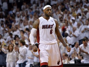 Miami Heat forward LeBron James (6) reacts against the Indiana Pacers in game four of the Eastern Conference Finals of the 2014 NBA Playoffs at American Airlines Arena. (Steve Mitchell-USA TODAY Sports)