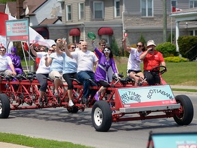 Tillsonburg's Big Bike, powered by Anytime Fitness and Scotiabank, pedals past 'HQ' Monday afternoon (Kelsey's Tillsonburg).