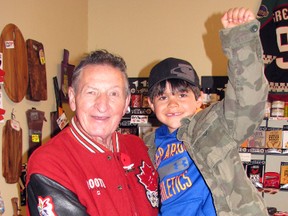 Matthew Menheere, of Mitchell, smiled and raised his fist with excitement when he met Walter Gretzky May 17 in Dublin. Menheere was one of dozens of children and adults who lined up to meet the famed Canadian celebrity. KRISTINE JEAN/MITCHELL ADVOCATE