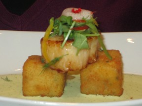 Sampling of sea scallop on polenta, Wildflower-style.