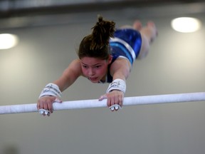 A young gymnast practises Tuesday at Carleton University for the national championships this week. (Chris Hofley/Ottawa Sun)