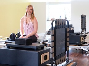 Owner Megan Orser sits in her fitness yoga studio at Breath of Fresh Air in Lambeth. (CRAIG GLOVER/The London Free Press)