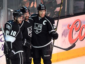 Kings players celebrate after scoring against the Blackhawksin Game 4 of the Western Conference final on Monday night. (Richard Mackson/USA TODAY Sports)