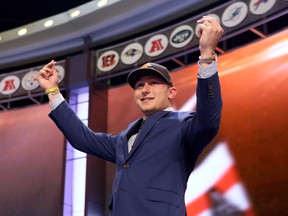 Social media and the football paparazzi are dumping displeasure on Cleveland Browns quarterback Johnny Manziel for being too much the playboy and funmeister. (Adam Hunger/USA TODAY Sports)