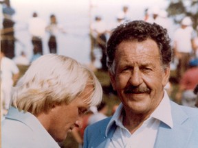 Canadian Golf Hall of Fame member Dick Grimm shares a moment with golf legend Greg Norman (left). Grimm, 91, passed away on Monday. (Canadian Golf Hall of Fame/photo)