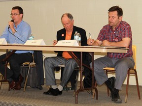 Lambton-Kent-Middlesex PC MPP Monte McNaughton, NDP candidate Joe Hill and Liberal candidate Mike Radan sparred about a range of issues during a debate hosted by the Lambton Federation of Agriculture and the National Farmers Union Tuesday. The debate took place in Brooke-Alvinston. CARL HNATYSHYN/ QMI AGENCY