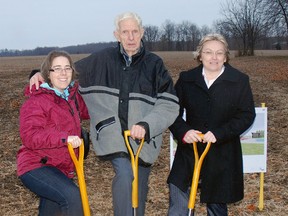 Laura Penner, left, chairman of Pearce Williams Christian Centre board, Giles Hume and Jan Newell, grabbed shovels for a groundbreaking ceremony in 2013 for the new Hume Hall at Pearce Williams.